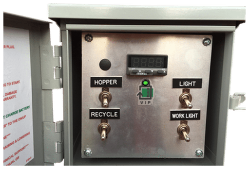 A green indicator light located inside the electrical enclosure signals to the operator the battery is charged.